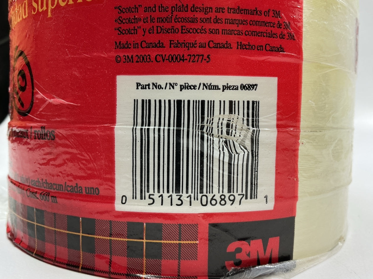3M 06897 Scotch 180' X 0.7'' Clear Filament Strapping Fiber Tape - 7 Rolls