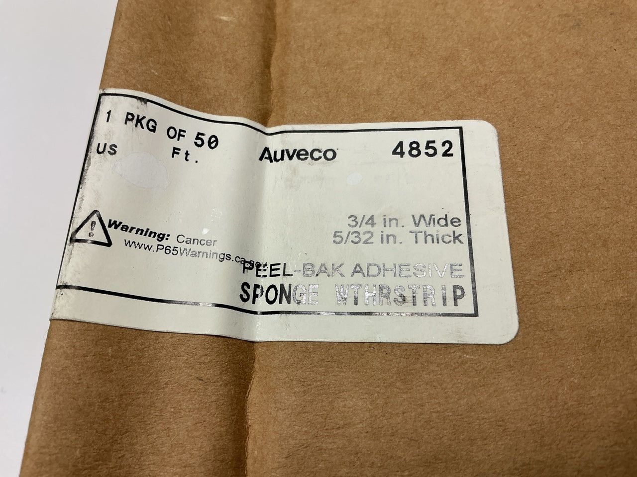 Auveco 4852 5/32'' X 3/4'' X 50 Feet Peel-Bak Neoprene Sponge Weatherstrip Seal