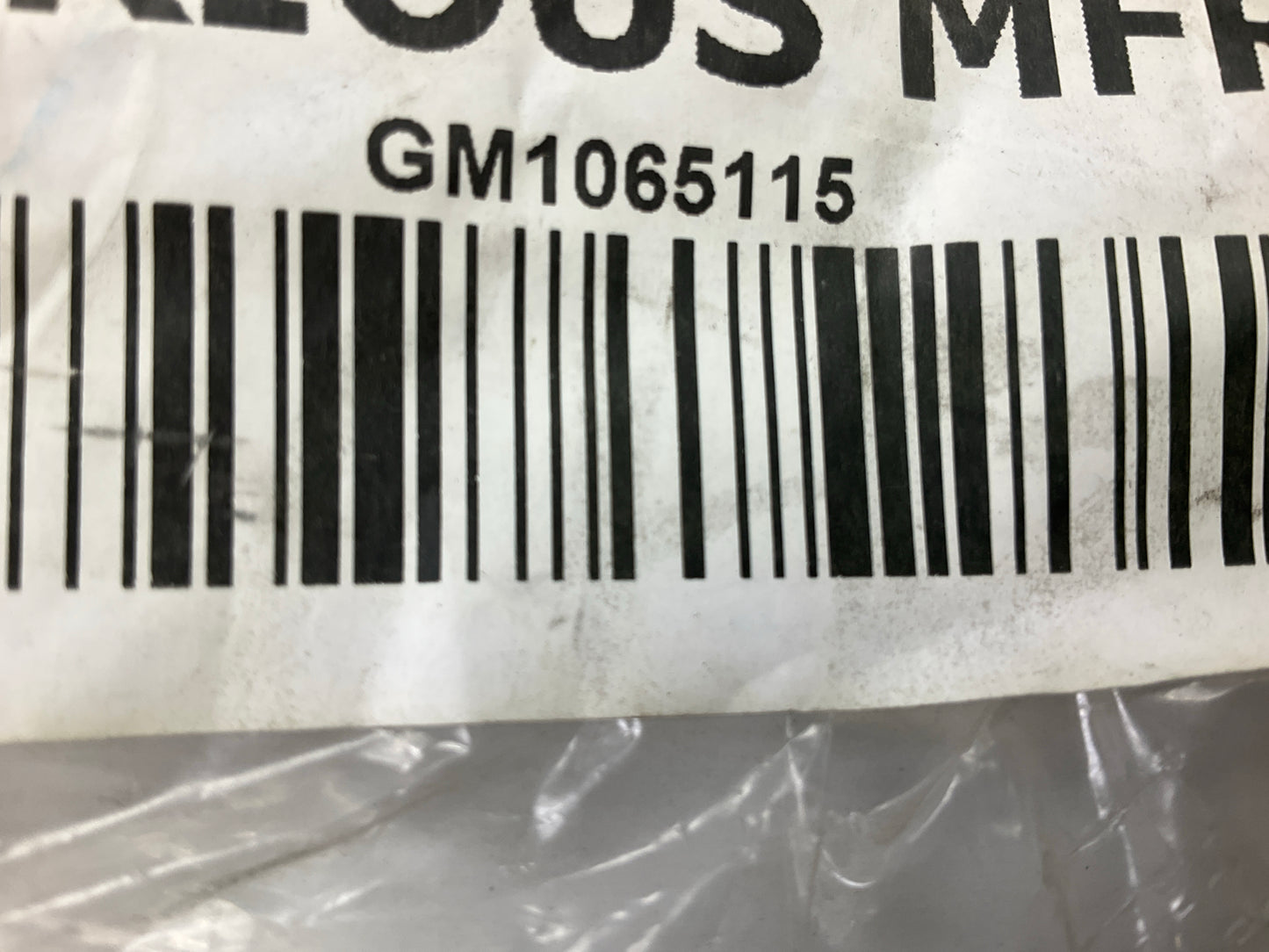 NEW AFTERMARKET - Front Center Bumper Retainer Bracket GM1065115