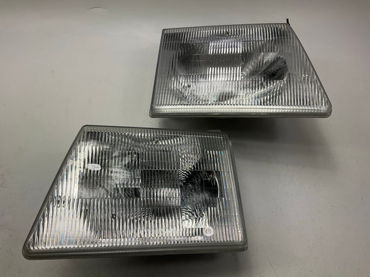 NEW UNBOXED OEM Ford Left & Right Headlight Headlamp (SET) 92-96 E150 E250 E350
