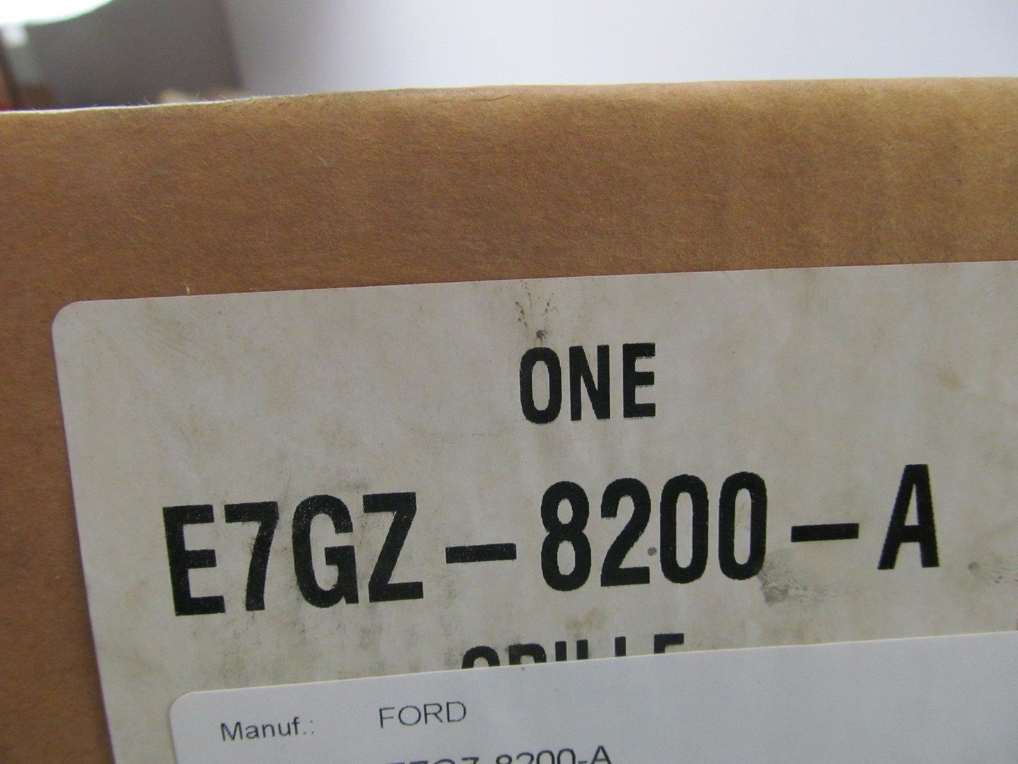 NOS OEM Ford E7GZ-8200-A Grille - 1987-1989 Mercury Tracer