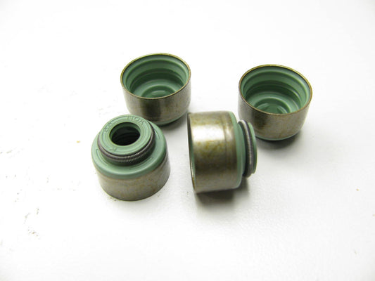 (4) NEW - OEM Ford F32Z-6571-B-4 Valves Stem Seals