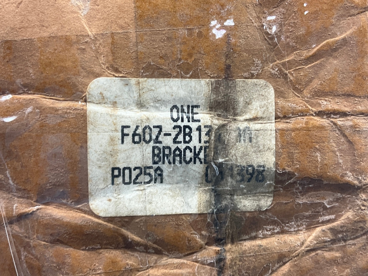 NEW - OEM Ford F6OZ-2B134-AA Front Disc Brake Caliper Bracket