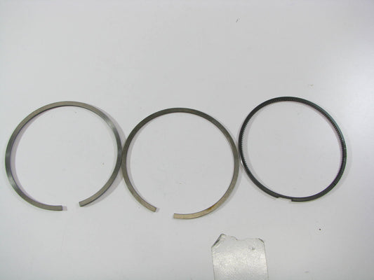 NEW - OEM Ford F7TZ-6148-AAA Complete Piston Ring Set STD 94-03 7.3L Powerstroke