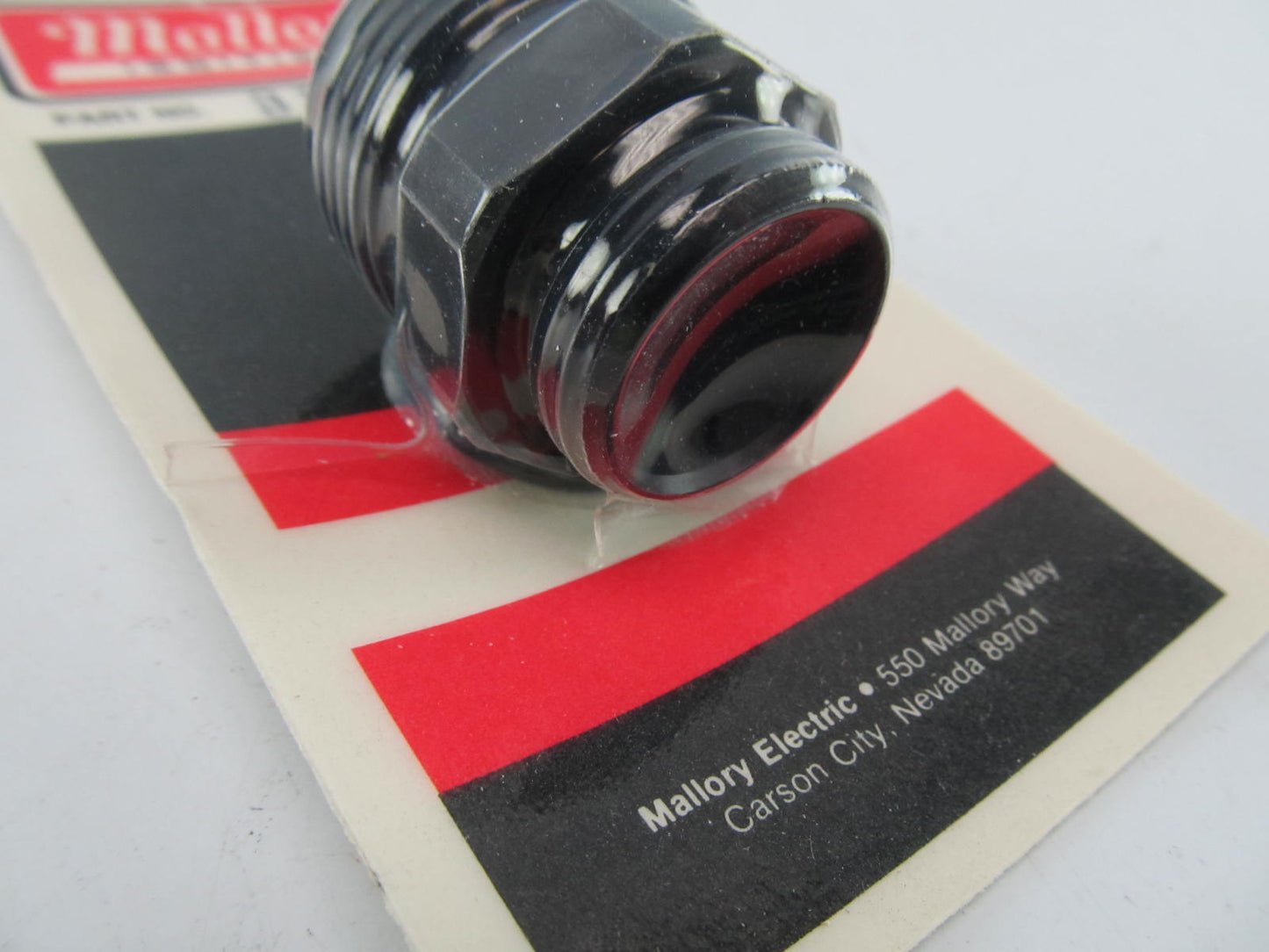 Mallory 31216 ( -12AN PORT TO -16AN 1-1/16-12 Thread) Fuel Fitting