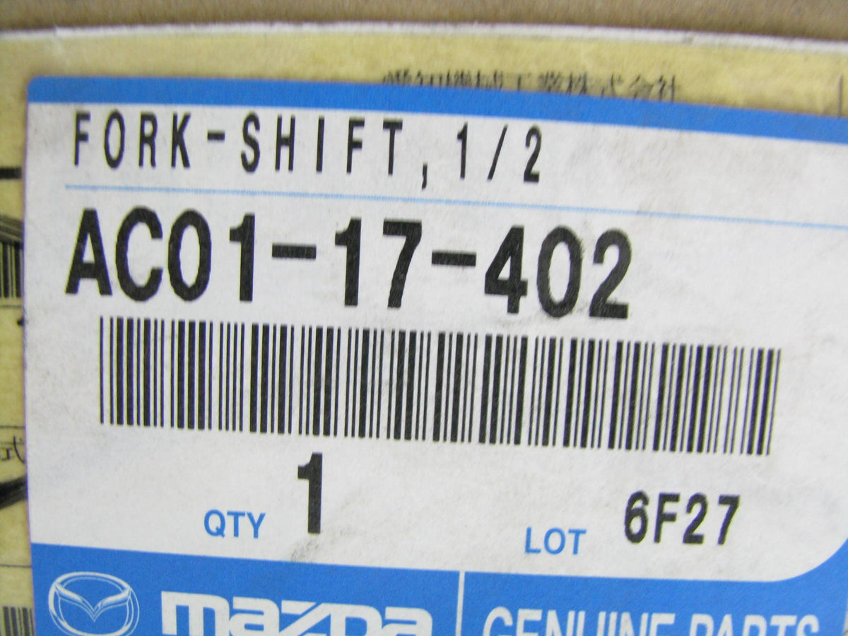 New OEM Mazda AC0117402 Manual Transmission 1st & 2nd Shift Fork 2005-11 Tribute