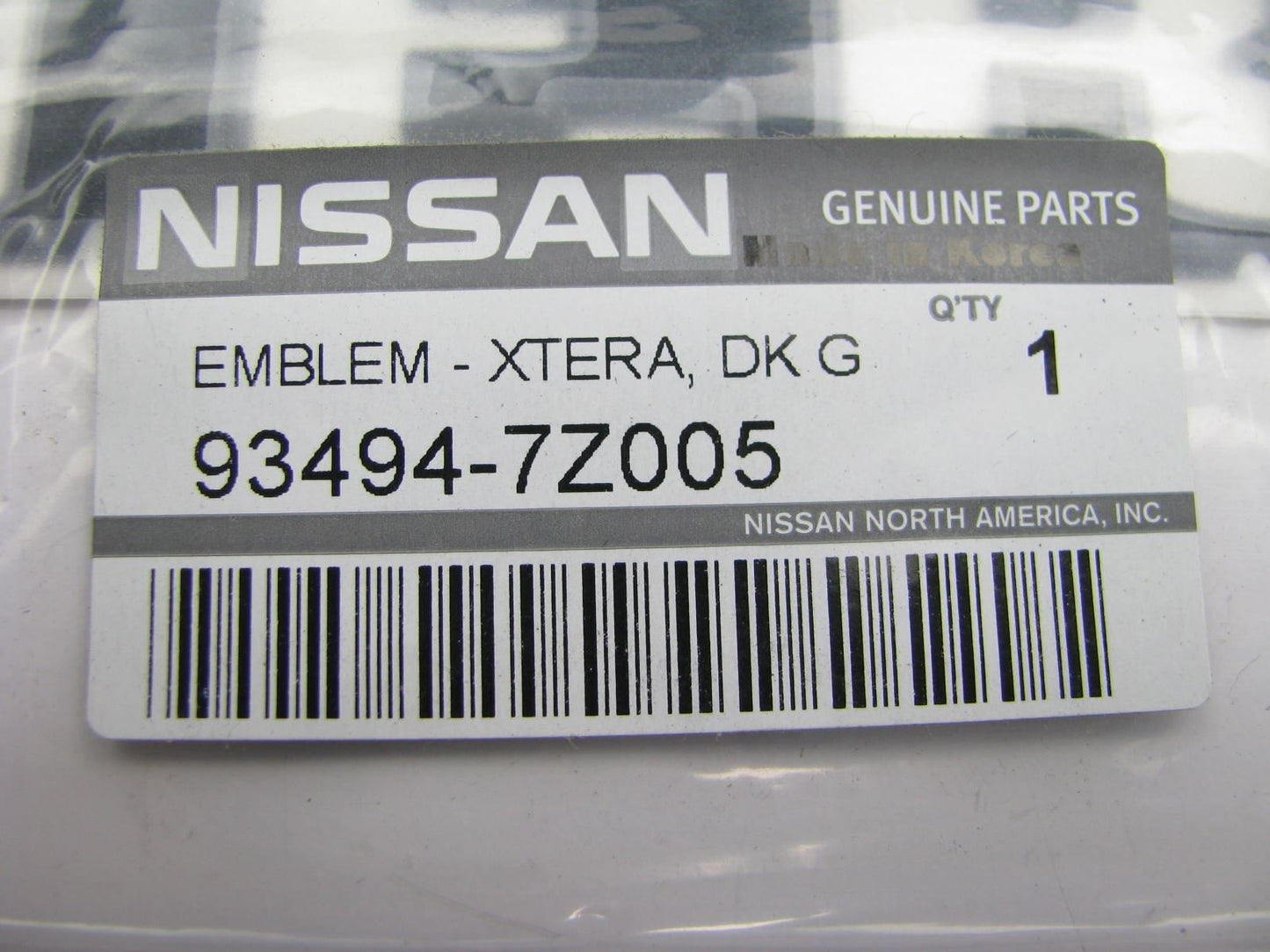 NEW GENUINE Dark Gray Liftgate Emblem For 2000-2001 Nissan Xterra 93494-7Z005