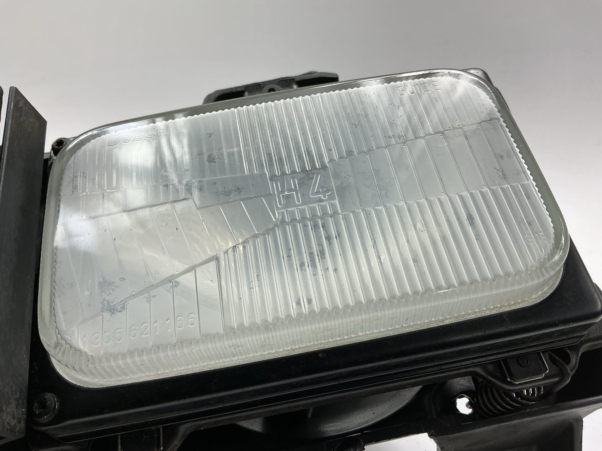 Damaged, See Photos - OEM GM 16506927 Left Headlight Housing With Both Headlamps