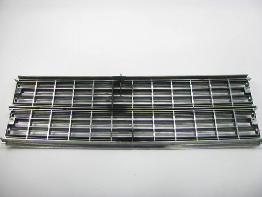 NEW - OUT OF BOX - OEM Radiator Grille 4270312 For 1984-1986 Dodge Caravan