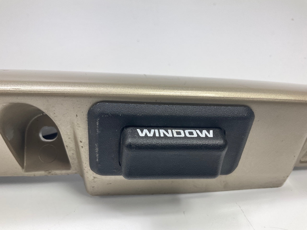 USED - 55155134AD Lift Gate License Plate Trim Champagne 99-04 Grand Cheroke