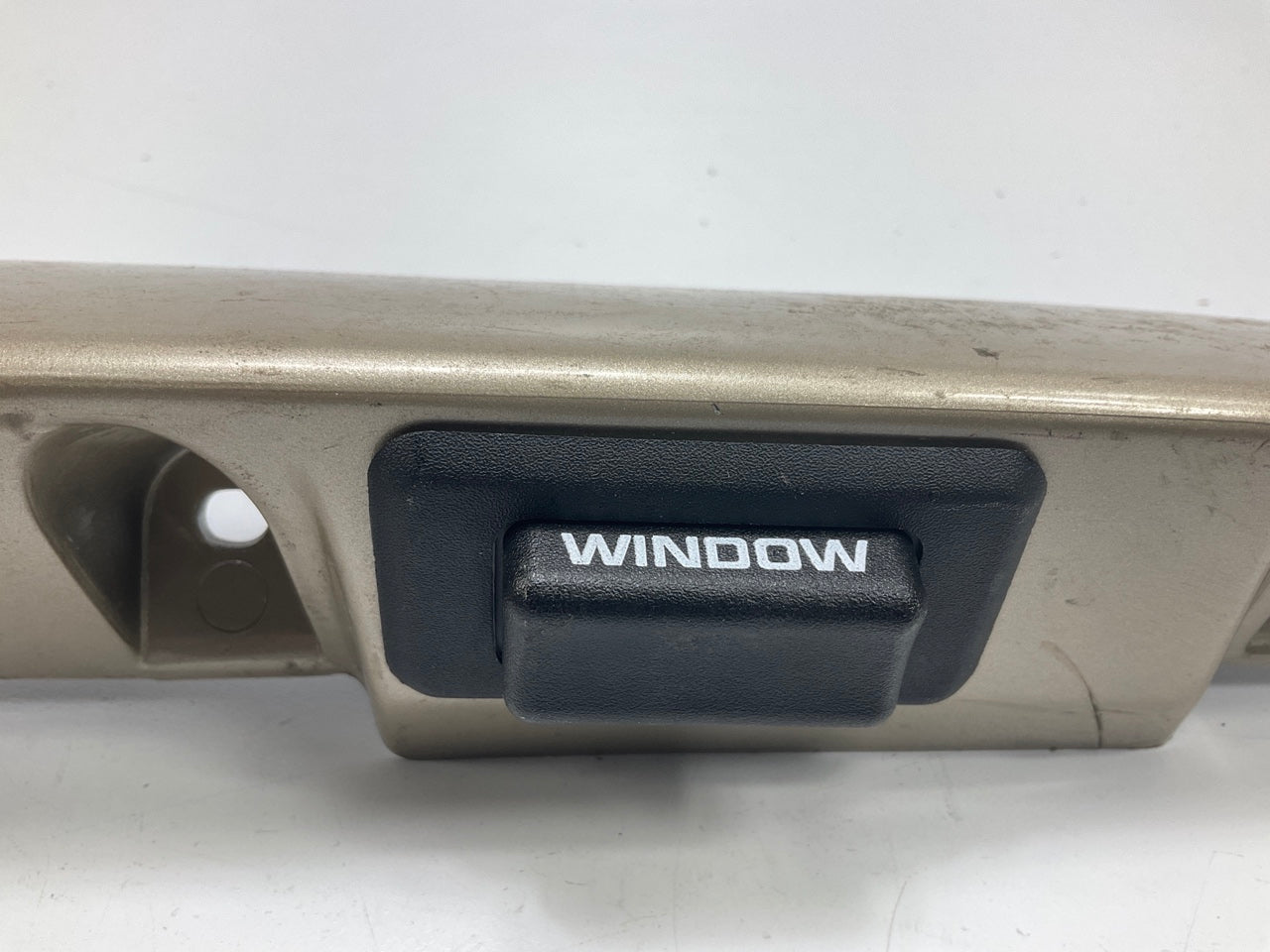 USED - 55155134AD Lift Gate License Plate Trim Champagne 99-04 Grand Cheroke