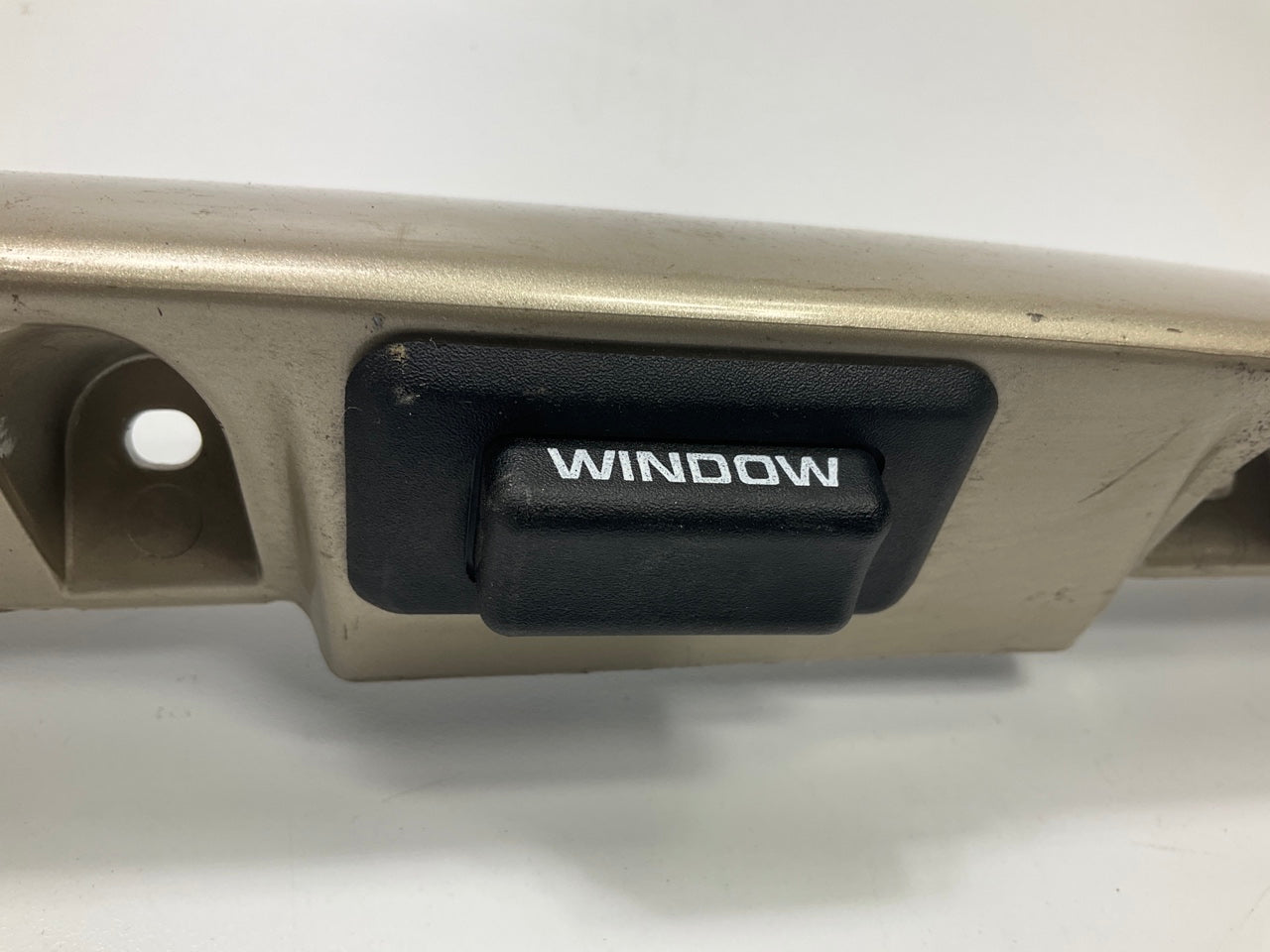 USED - 55155134AD Lift Gate License Plate Trim Champagne 99-04 Grand Cheroke