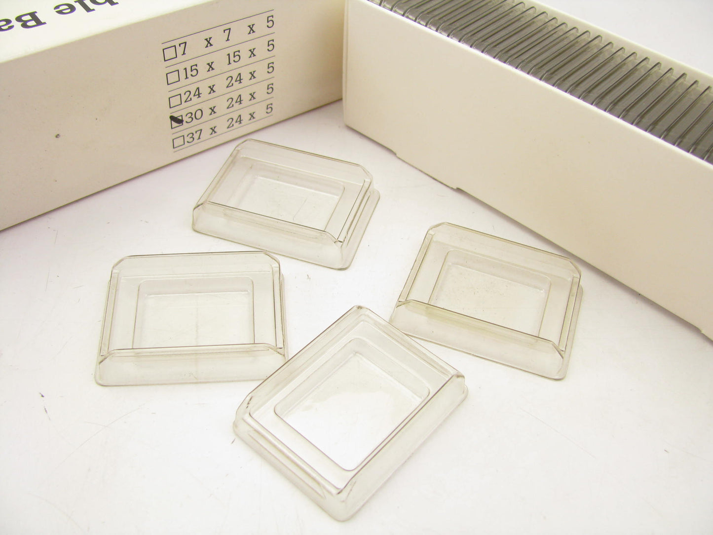 OPEN BOX - Disposable Base Molds LOT, COMES AS IS AS SHOWN