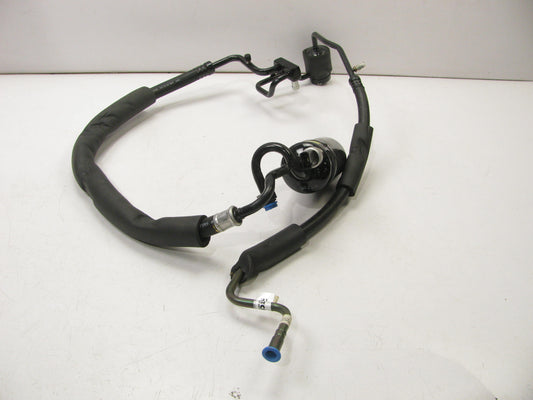NEW OUT OF BOX - OEM Ford F2LH-19D734-AB A/C Accumulator With Hose Assembly