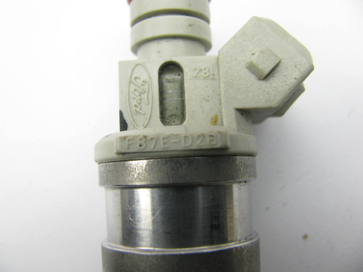 NEW - OUT OF BOX - OEM Ford F87E-D2B Fuel Injector