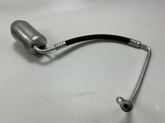 NEW - OUT OF BOX T83065 A/C Receiver Drier With Hose Assembly