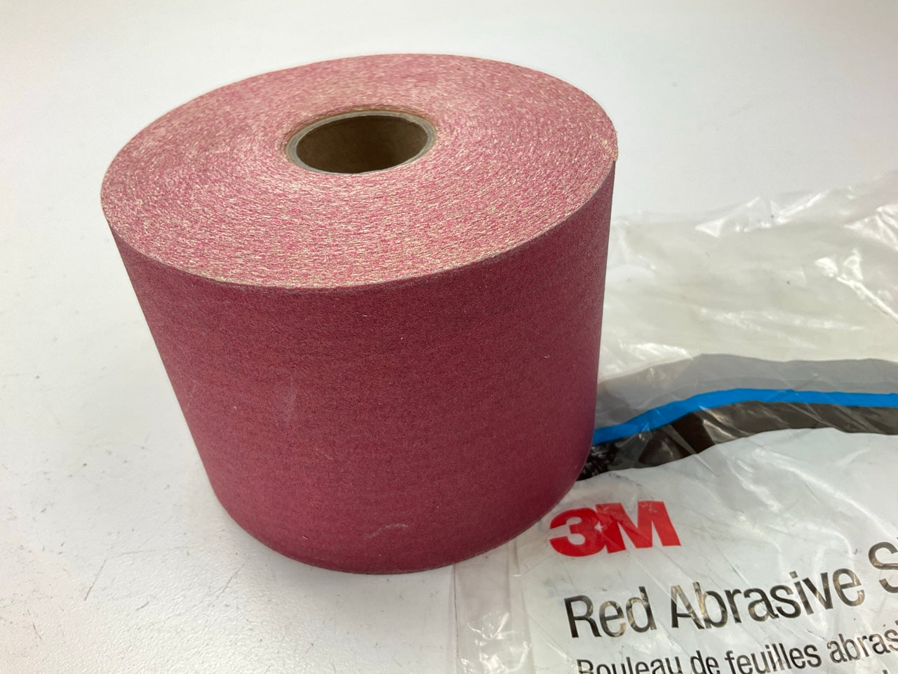 3M 01685 Stikit Red Abrasive PSA Sheet Sandpaper Roll - P180 Grit 2.75'' X 25 Yd