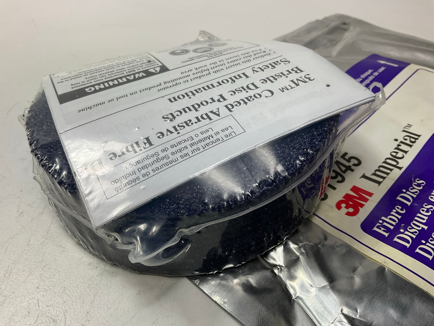 3M 01945 Imperial 5'' X 7/8'' 24 Grit Fiber Abrasive Grinding Disc - 10 / Pack