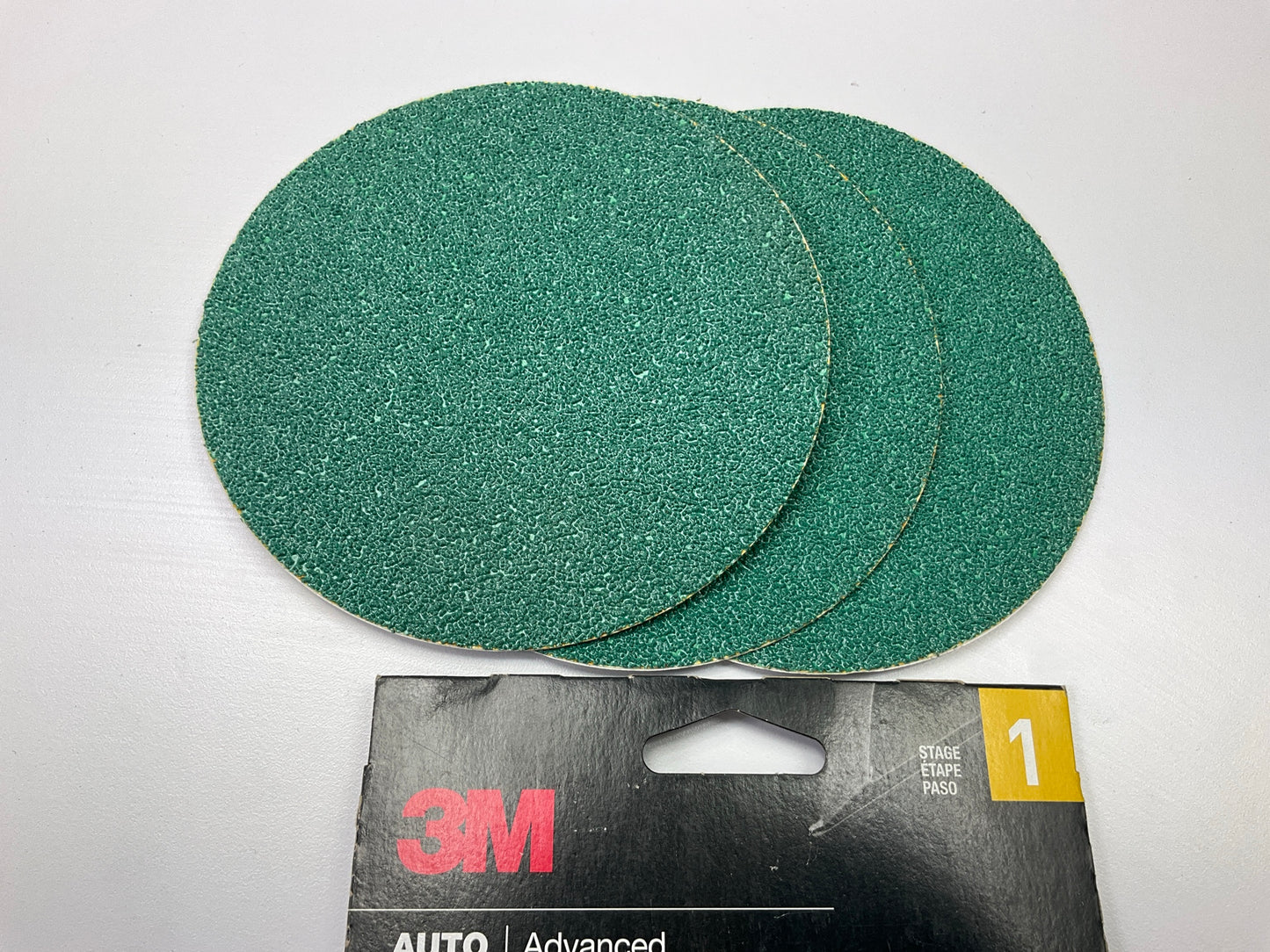3M 03112 Stikit 5'' 40 Grit Aluminum Oxide Non-Vacuum PSA Sanding Discs - 3 Discs