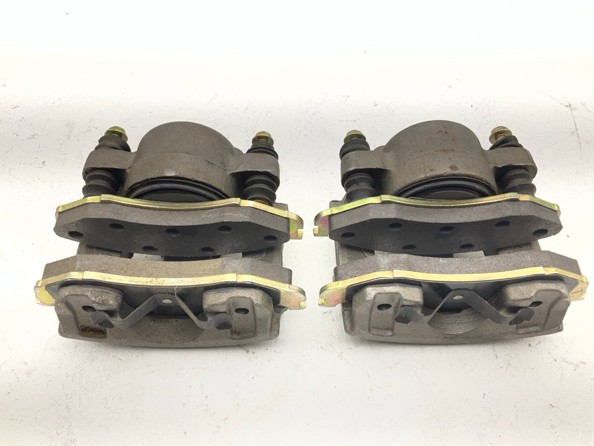 REMAN. American 530001 Front Brake Caliper Set, Loaded With Pads