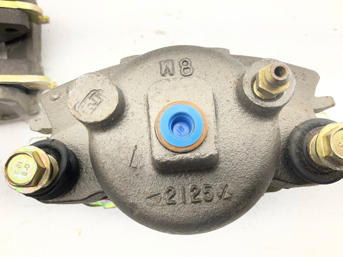 REMAN. American 530001 Front Brake Caliper Set, Loaded With Pads
