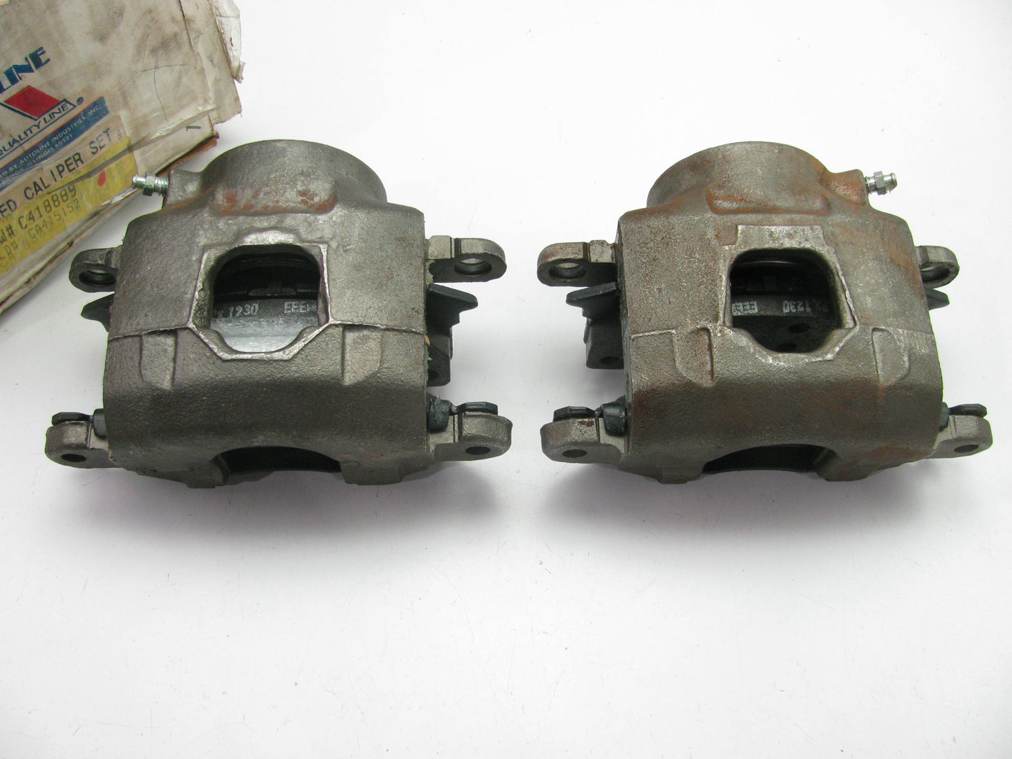 MISSING BOLTS - Autoline C418889 Front Brake Caliper Set W/ Brake Pads