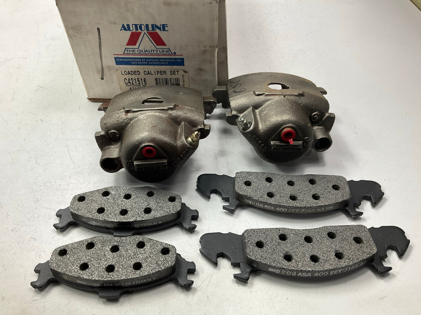 Reman. Front Brake Calipers W/ Pads - MISSING GUIDE PIN BOLTS