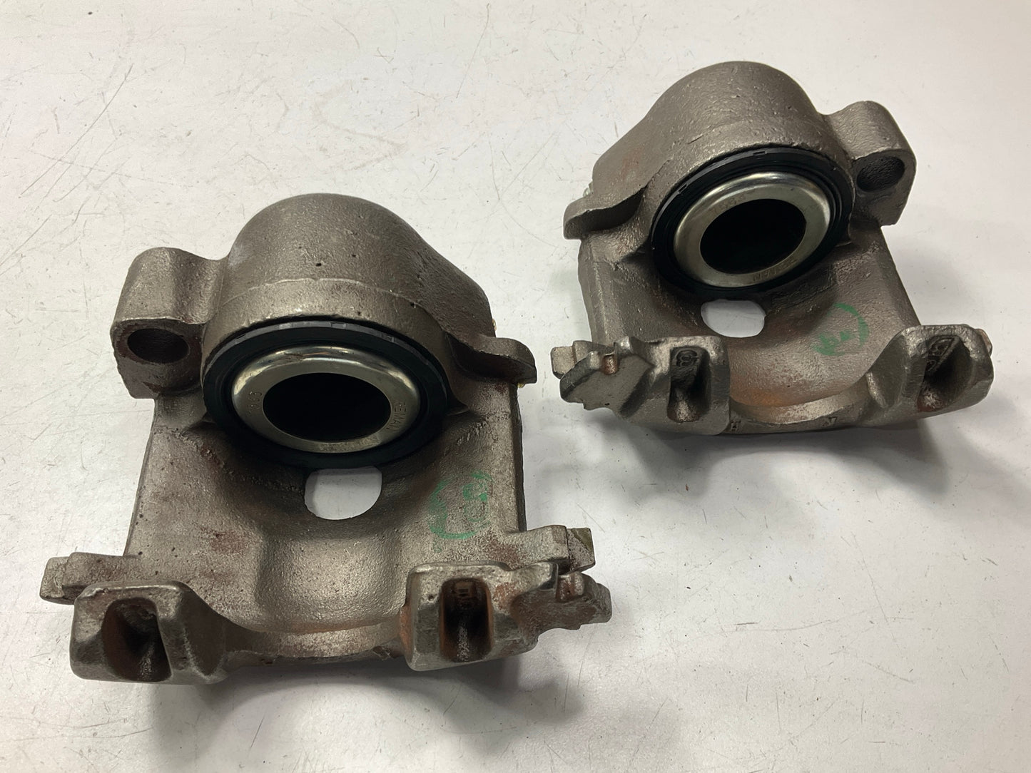 Reman. Front Brake Calipers W/ Pads - MISSING GUIDE PIN BOLTS