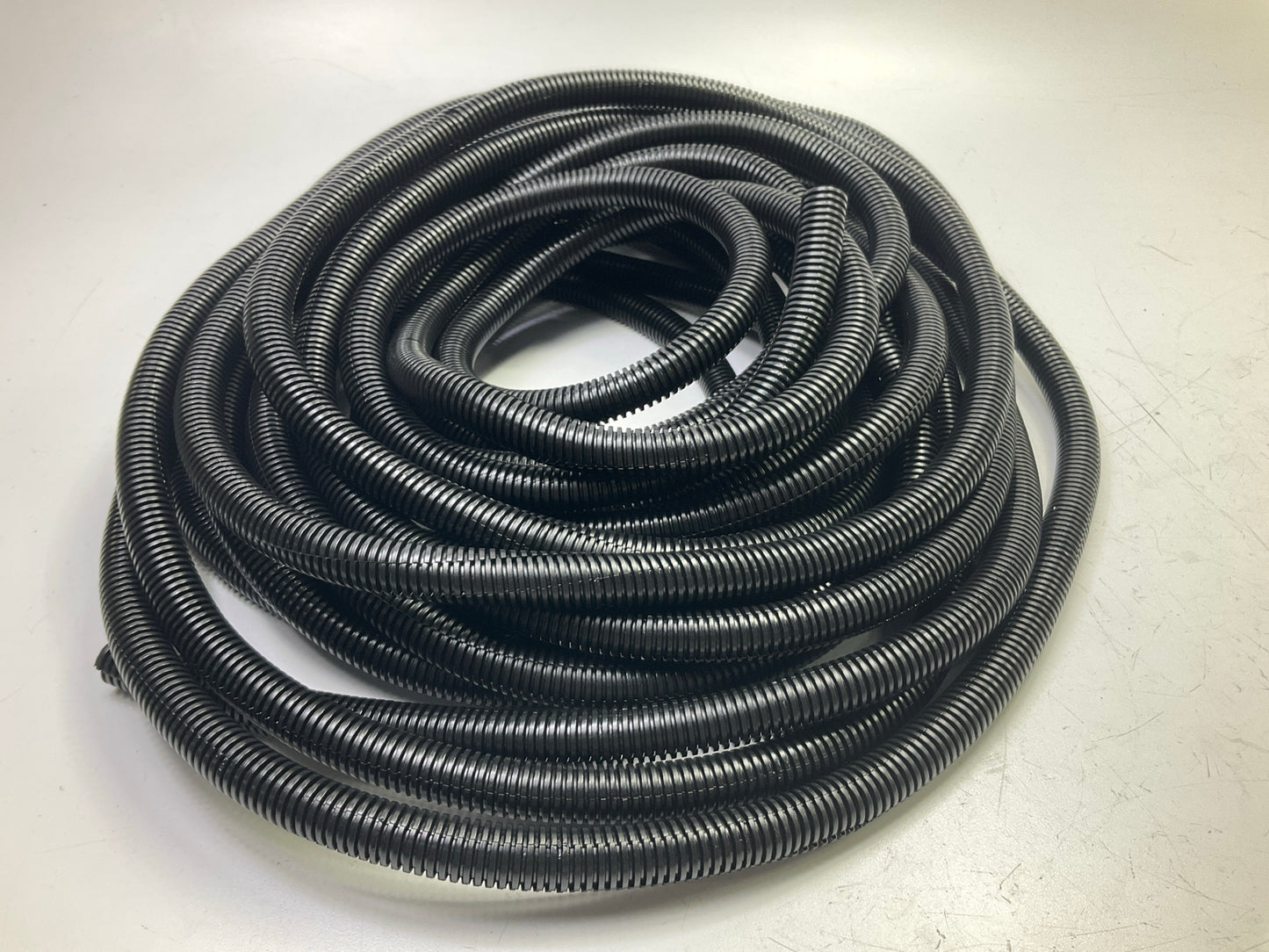 Auveco 14203 Split Flexible Loom 1/2'' I.D. 11/16'' O.D. 50' Length