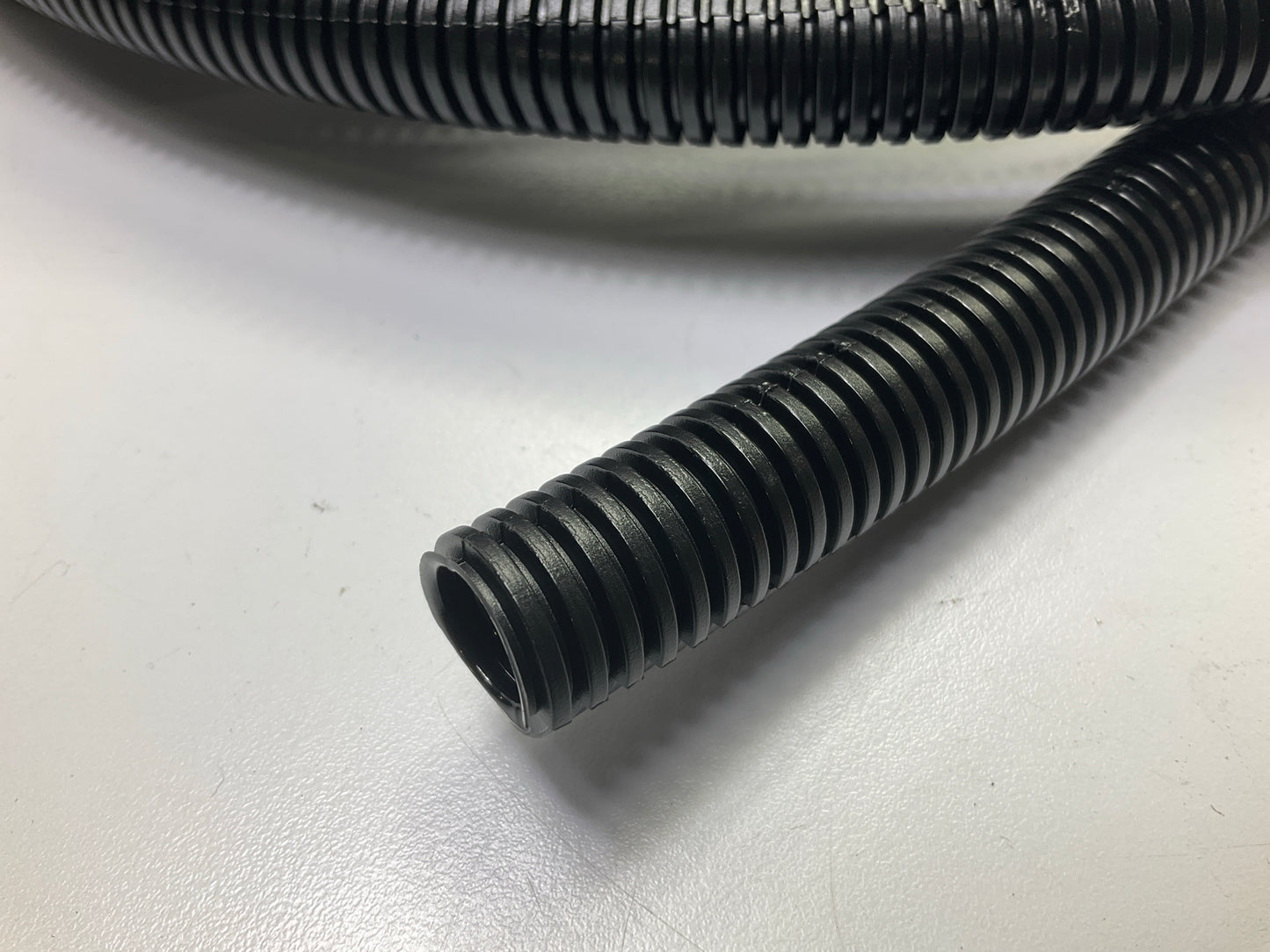 Auveco 14203 Split Flexible Loom 1/2'' I.D. 11/16'' O.D. 50' Length