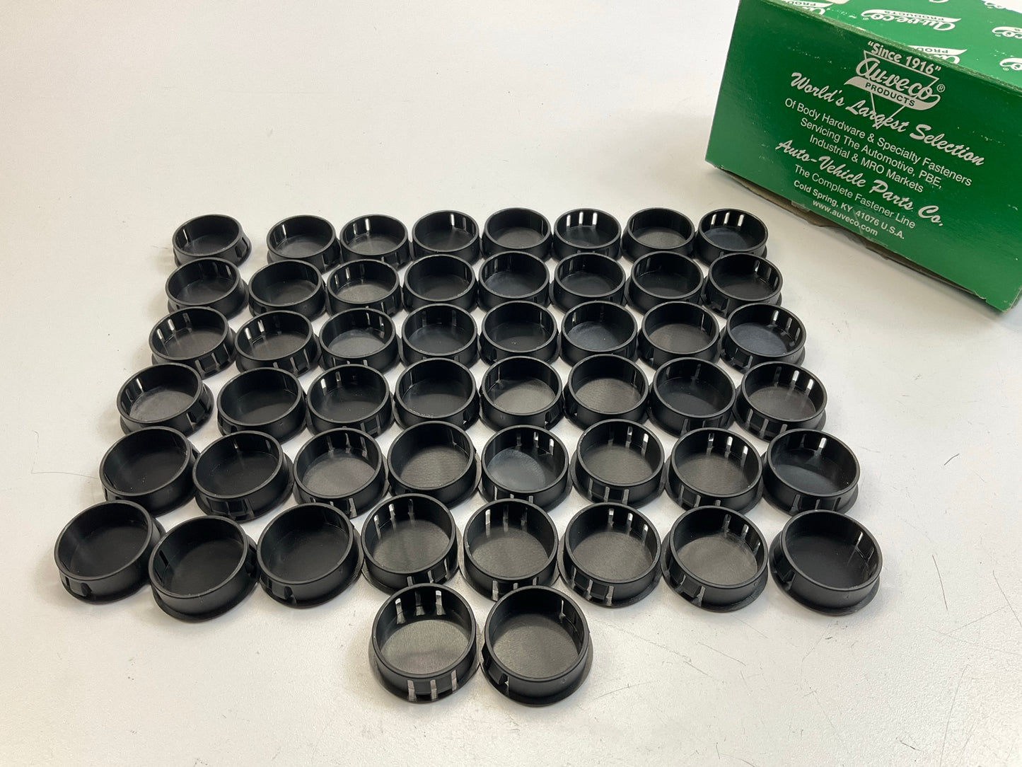 Auveco 19771 Black Nylon Locking Hole Plugs, 1-3/16'' Panel Hole, Pack Of 50 Pcs