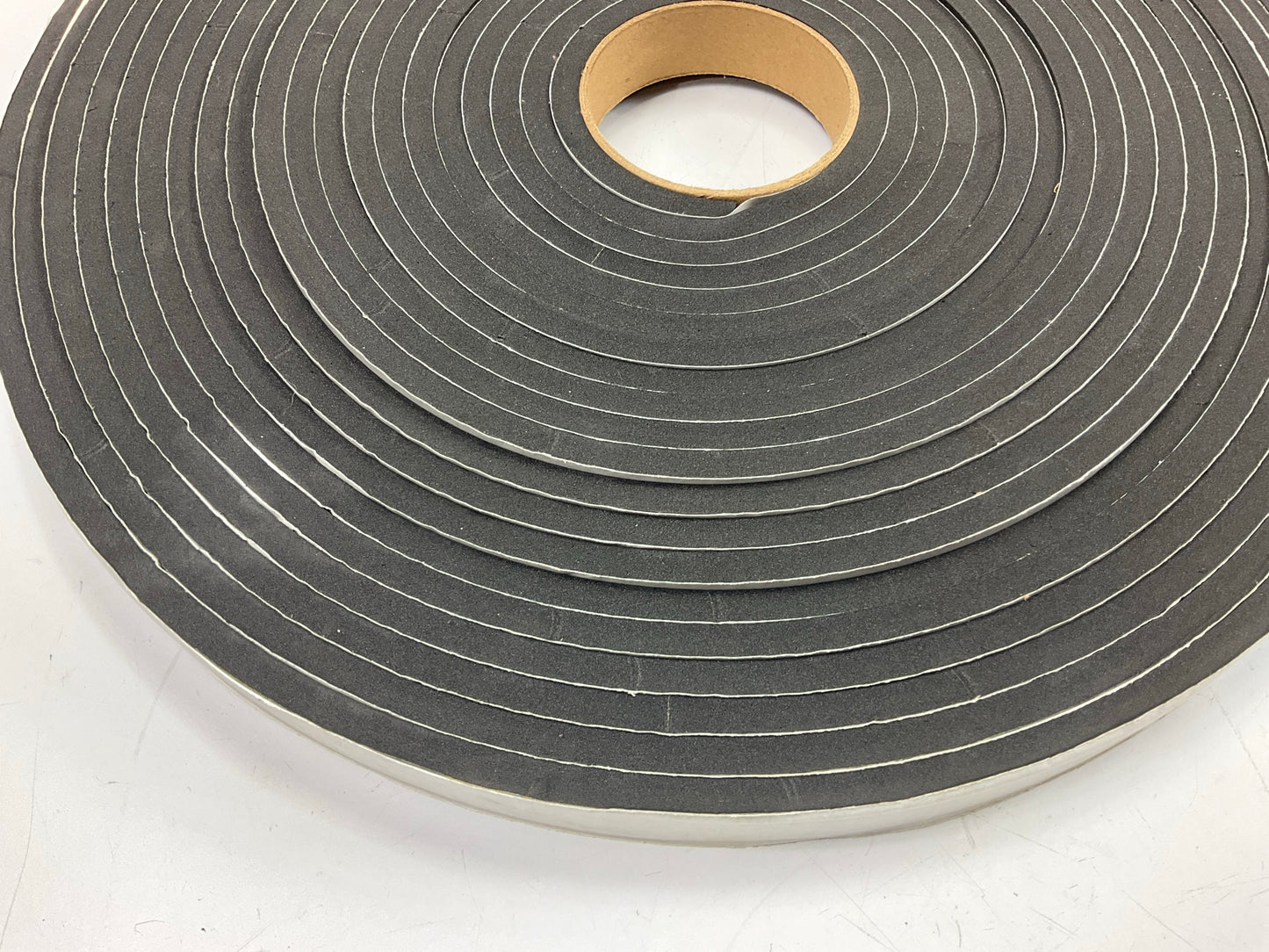 Auveco 4857 5/16'' X 1'' X 50 Feet Peel-Bak Neoprene Sponge Weather Stripping Seal