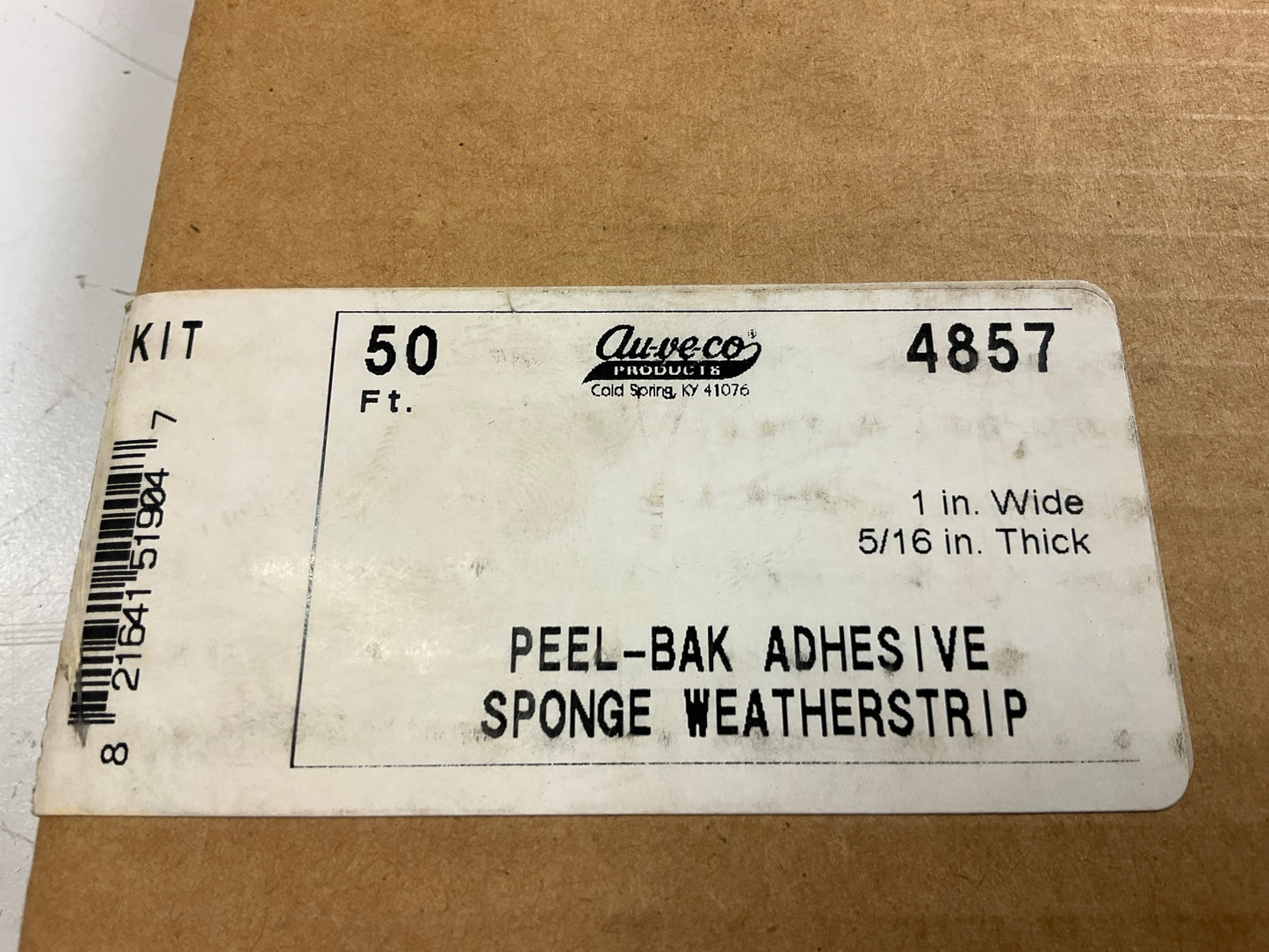 Auveco 4857 5/16'' X 1'' X 50 Feet Peel-Bak Neoprene Sponge Weather Stripping Seal