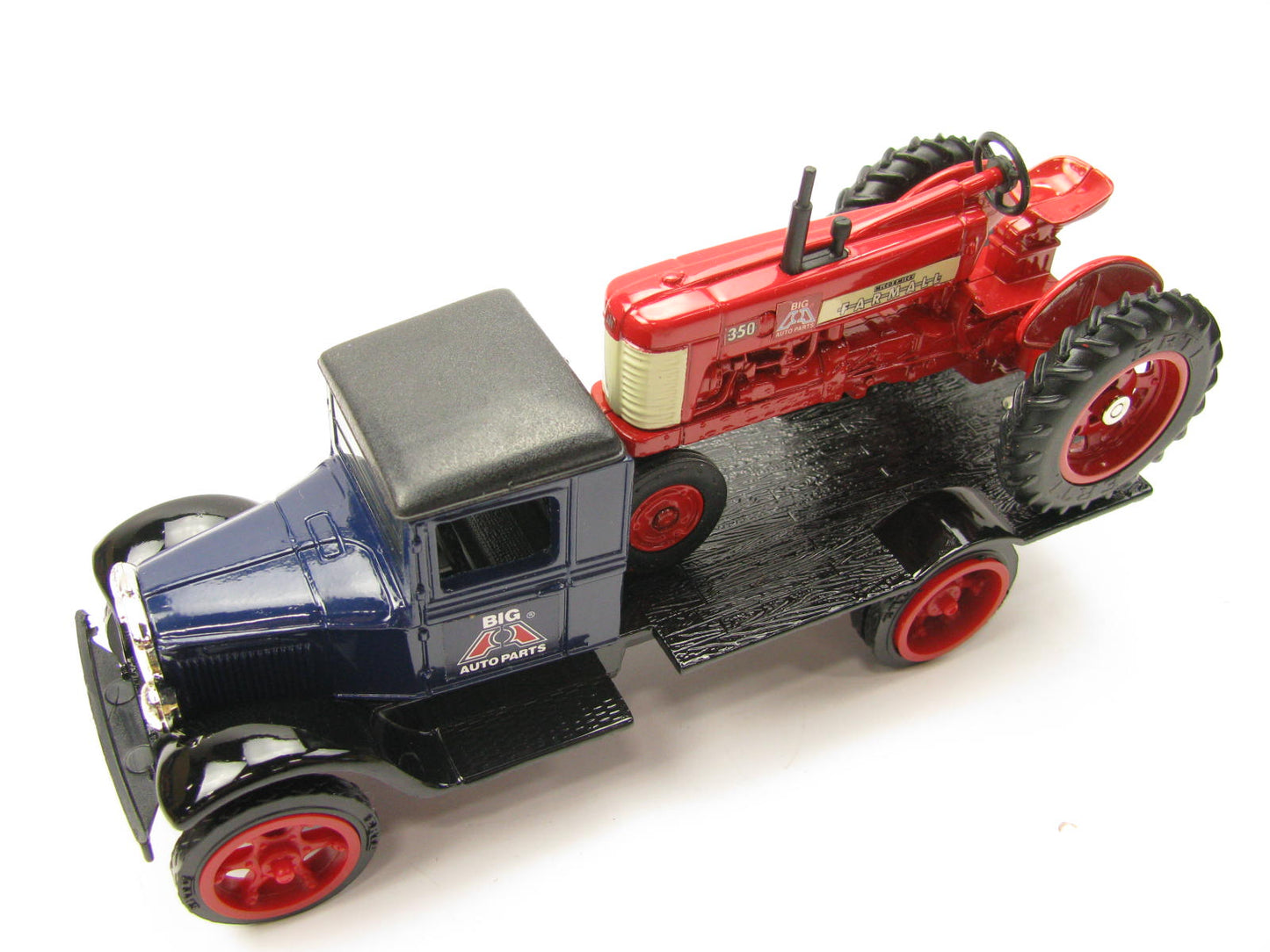 ERTL BIG A AUTO PARTS 1931 Hawkeye Flatbed Model Truck With FARMALL 350 Tractor