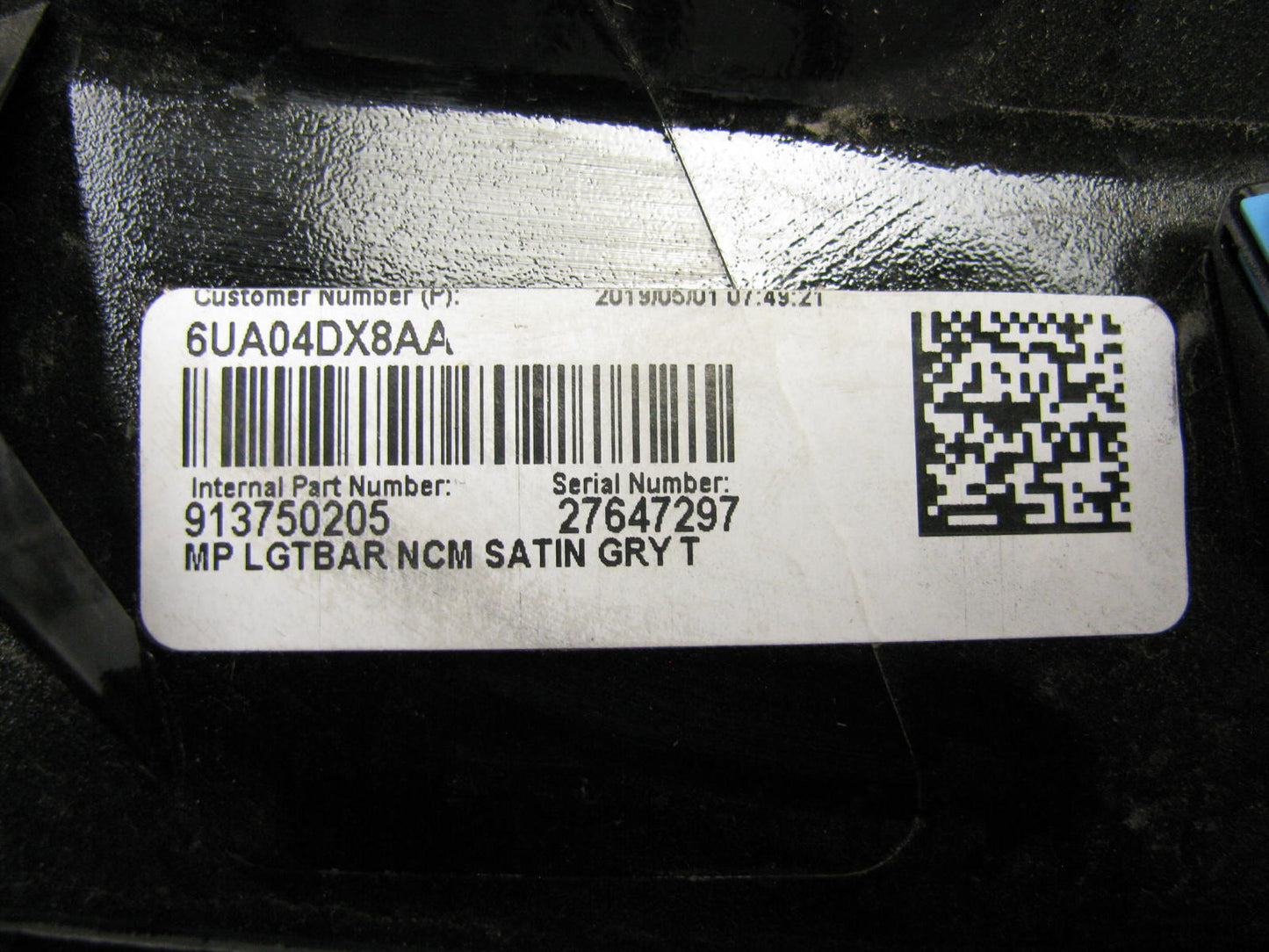 License Lamp Applique 6UA04DX8AA Rear - MINOR DAMAGE -