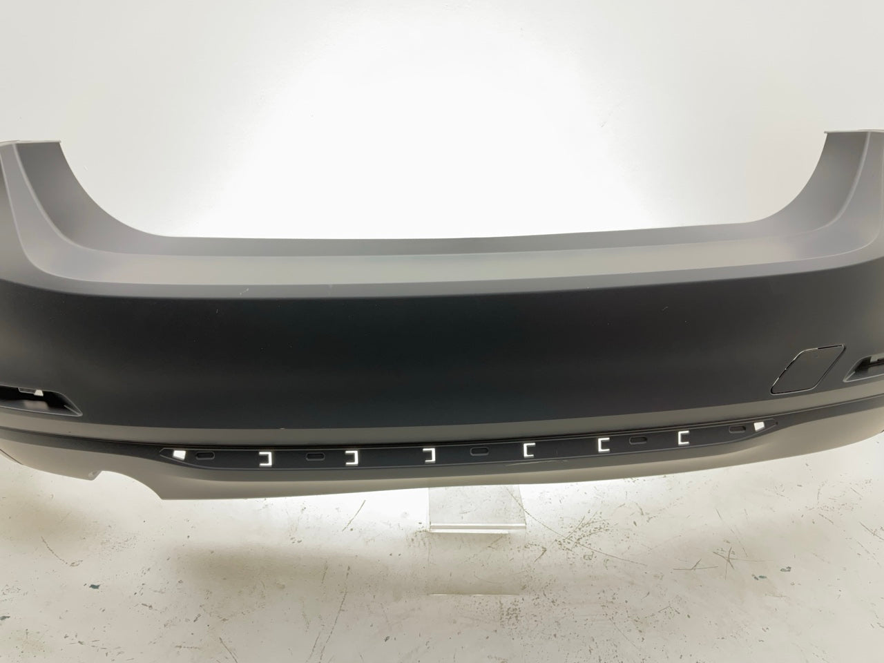 New 2012 BMW 328i 335i Rear Bumper Cover (Without Park Assist Sensor Holes)
