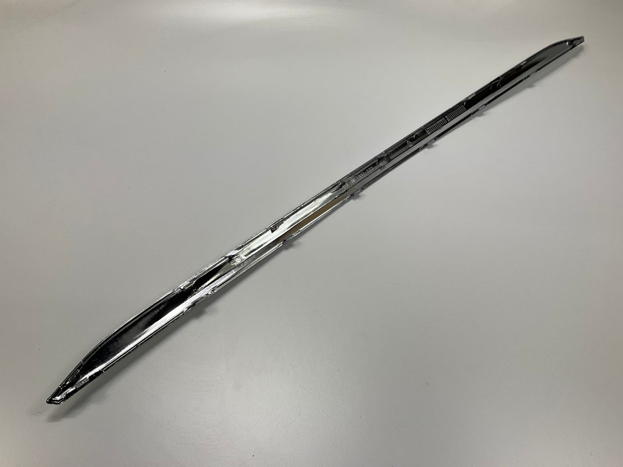 NEW - AFTERMARKET BM1144115 Chrome Rear Bumper Trim