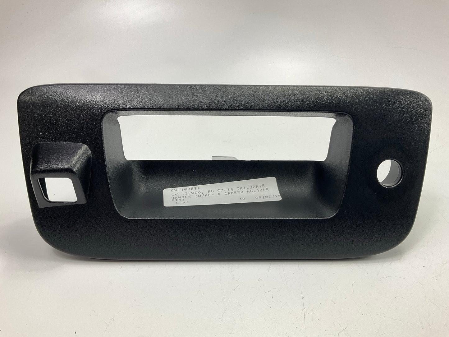 NEW CVT1086TX Tailgate Handle Bezel Only (With Keyhole, With Backup Camera Hole)