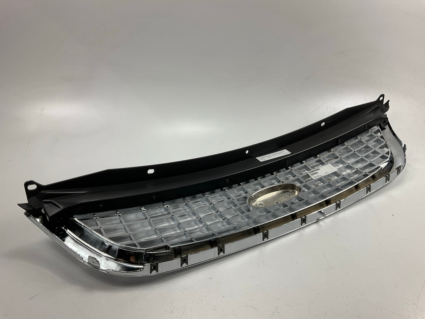 FDW1070AA Grille 2001-2003 Ford Windstar Chrome Shell W/ Black Insert Plastic