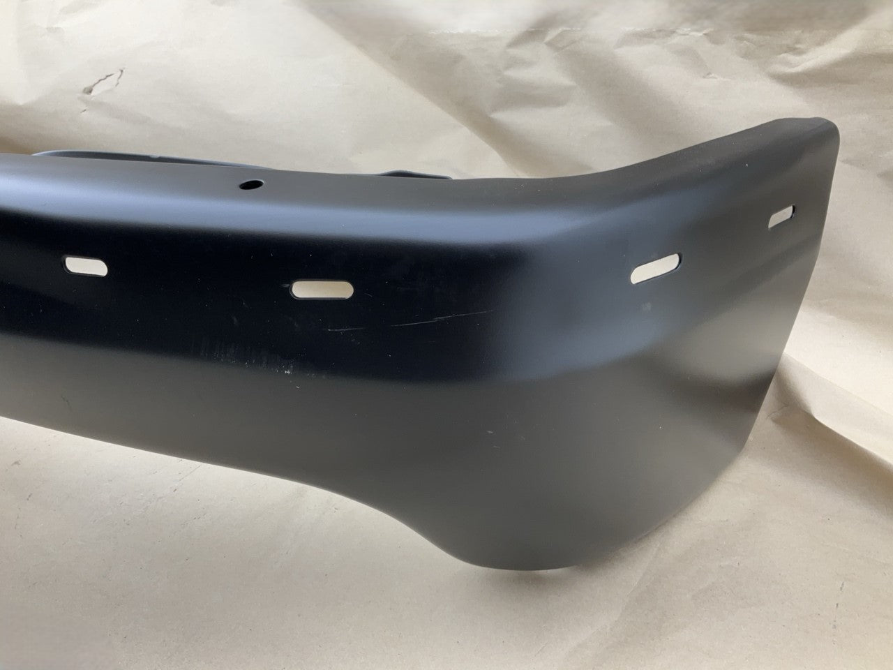 GM1002375 Front Black Steel Bumper - 1999-02 Silverado 1500, 00-06 Suburban 1500