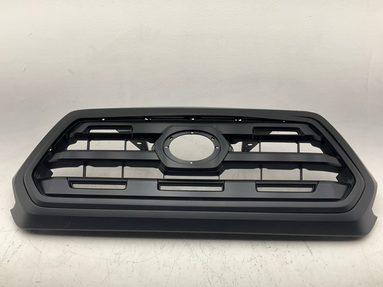 SURFACE SCRATCHES 2016-22 Toyota Tacoma Front Upper Grille Assembly Matte Black