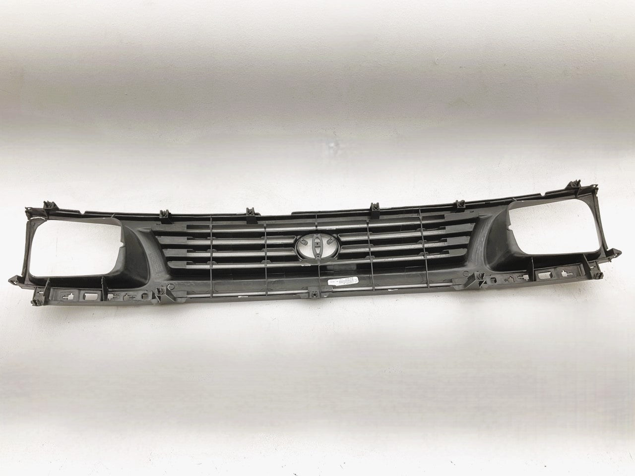 NEW AFTERMARKET TYT5070GB Grille - 1995-1996 Tacoma Rear Wheel Drive 2WD ONLY