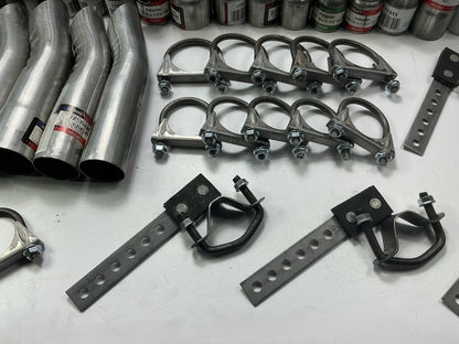 110 Piece Exhaust Component Lot: Common Adapters, Exhaust Pipe Elbows & Clamps
