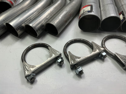 110 Piece Exhaust Component Lot: Common Adapters, Exhaust Pipe Elbows & Clamps