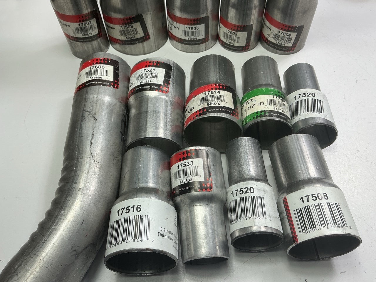 110 Piece Exhaust Component Lot: Common Adapters, Exhaust Pipe Elbows & Clamps