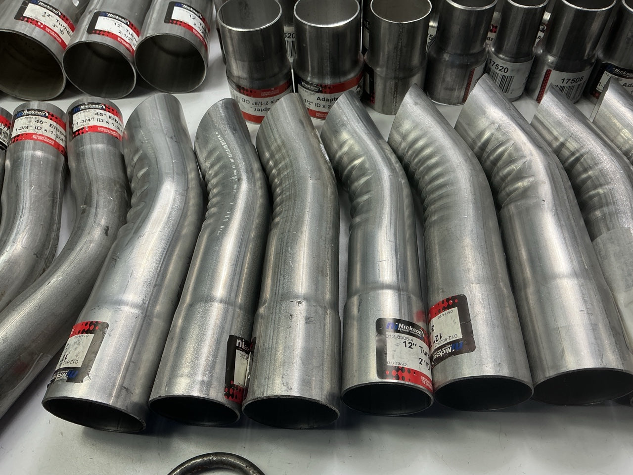 110 Piece Exhaust Component Lot: Common Adapters, Exhaust Pipe Elbows & Clamps