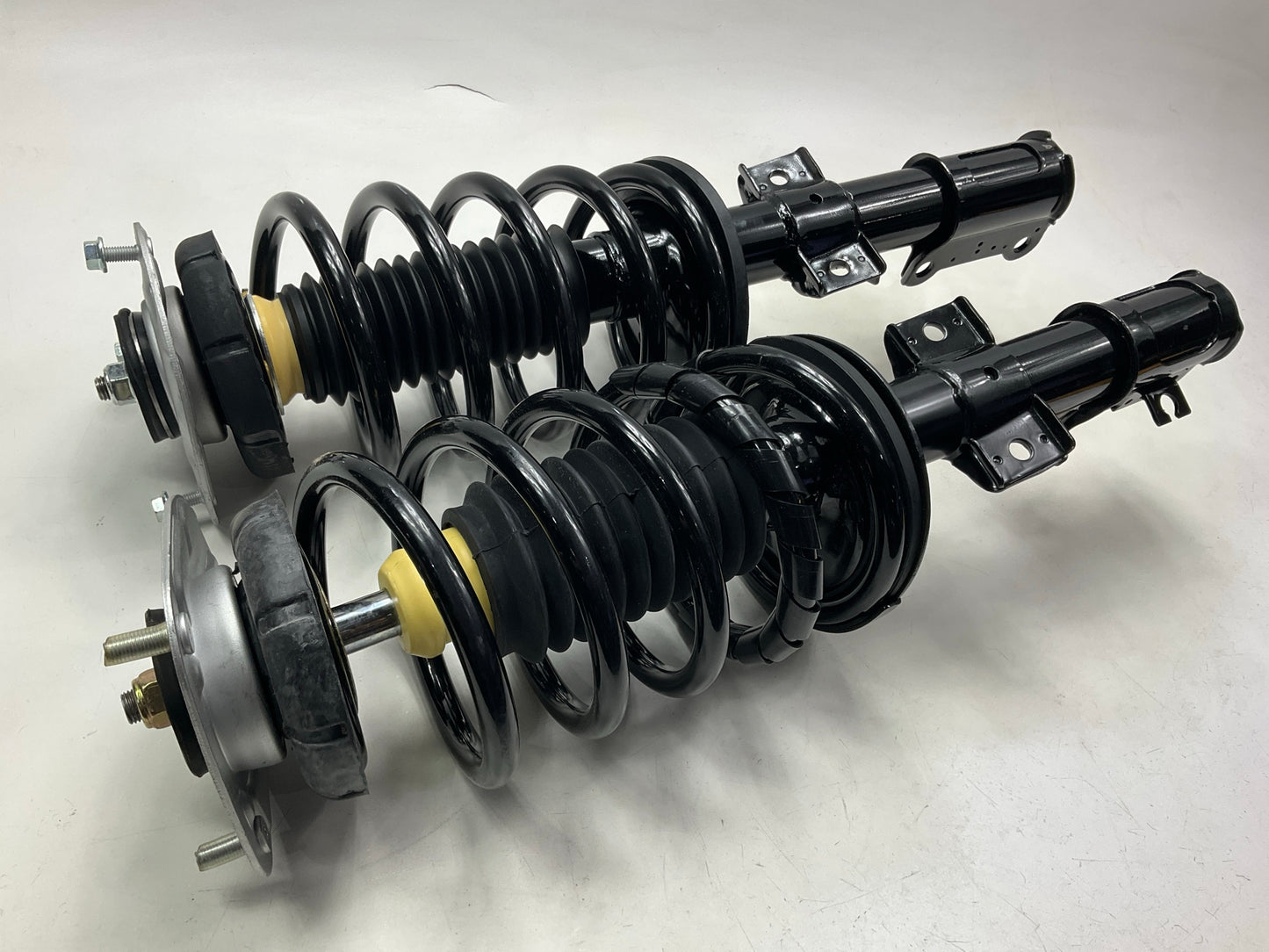 Unity 11485& 11486 Suspension Strut & Coil Spring Set - Front Left & Right