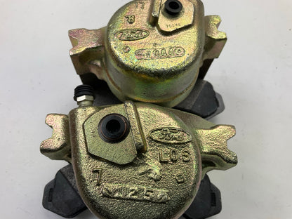 REMAN. Auto Specialty FRONT Brake Calipers W/ Brake Pads 42-85009 & 42-85010