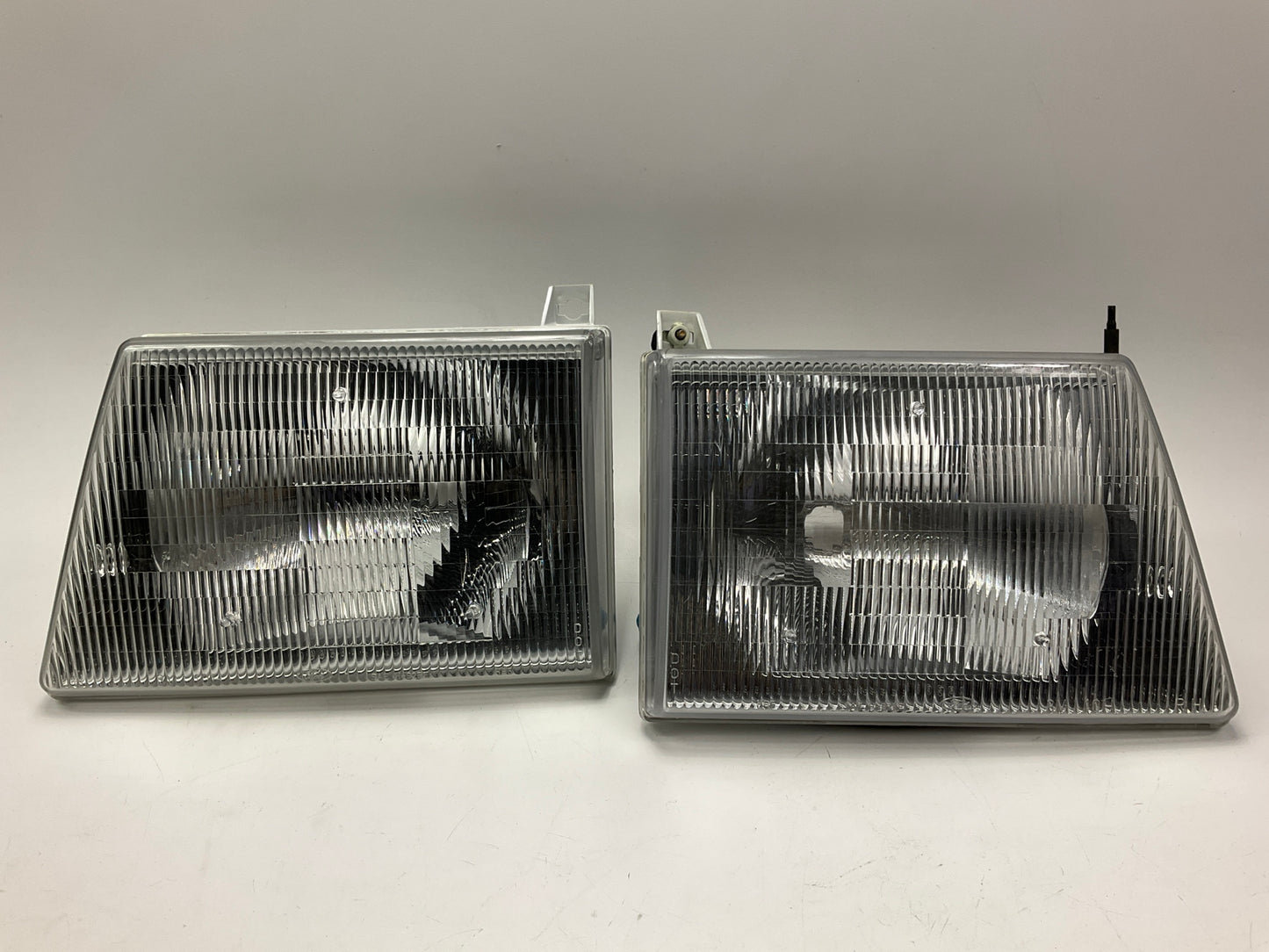 NEW UNBOXED OEM Ford Left & Right Headlight Headlamp (SET) 92-96 E150 E250 E350