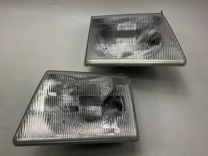 NEW UNBOXED OEM Ford Left & Right Headlight Headlamp (SET) 92-96 E150 E250 E350
